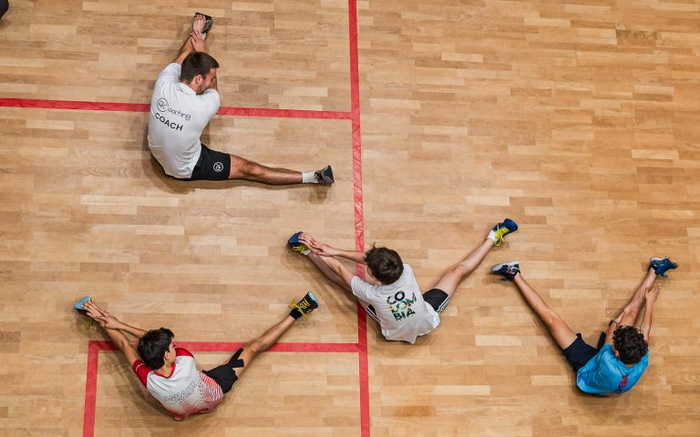 Young people playing squash